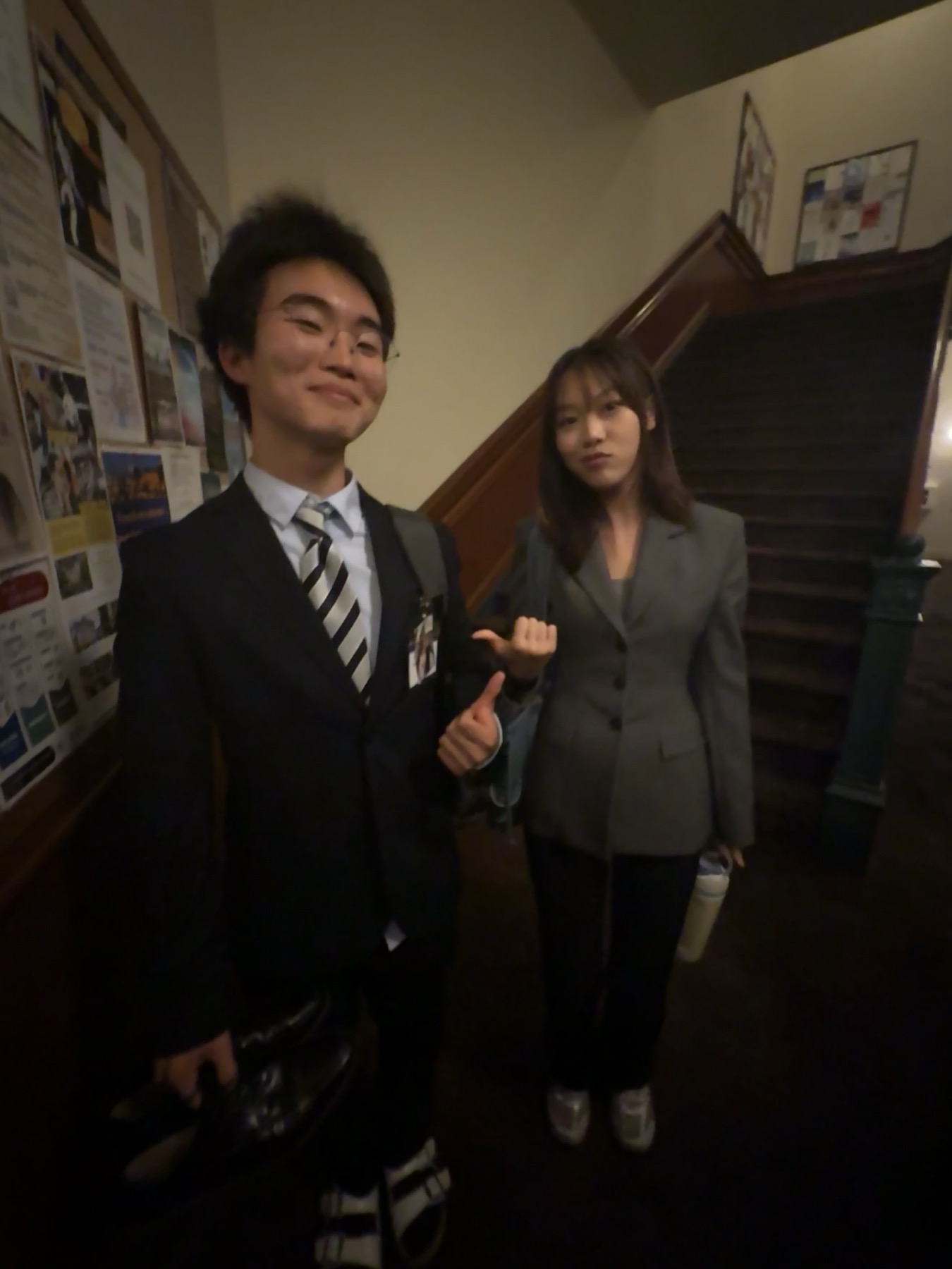 joshua and another delegate in suits